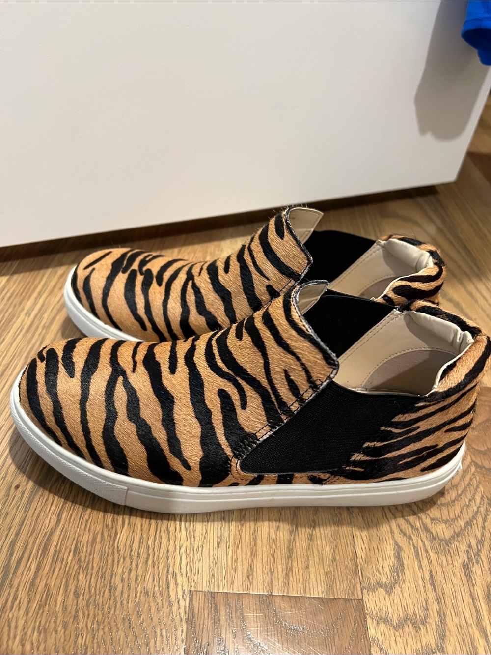 Coconuts by Matisse Tiger Print Slip-On Sneakers in Black and Tan